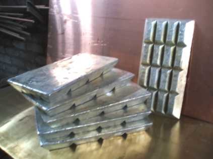 Олово чушки